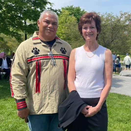 Photograph of lyda ruijter with chief mann outdoors at an event