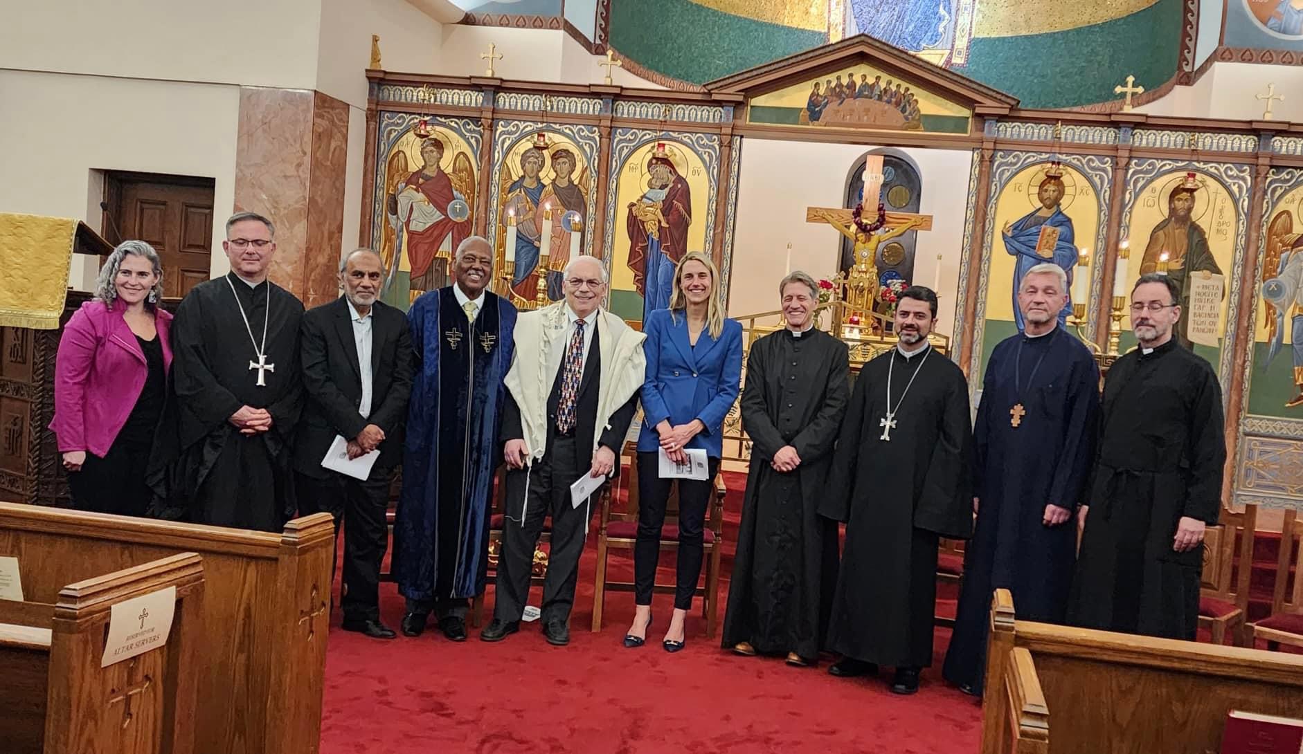 Mayor Simmons stands with members of the interfaith council